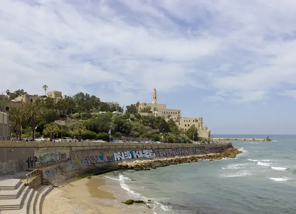The Old Jaffa hill with St. Peter's church rising above the beach and Mediterranean shore