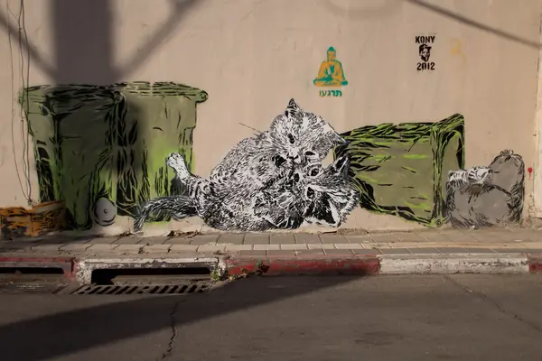 Street-art piece by the artist Dede on a wall in the lanes of Neve Tzedek, Tel Aviv